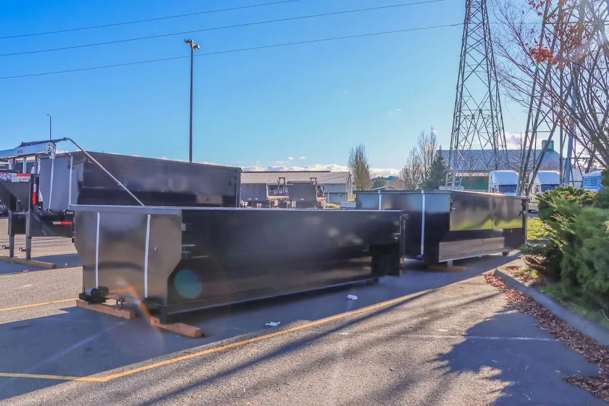Roll-off dumpster ready for waste disposal at job site for Demolition Dumpster Rental in Taylor Mill